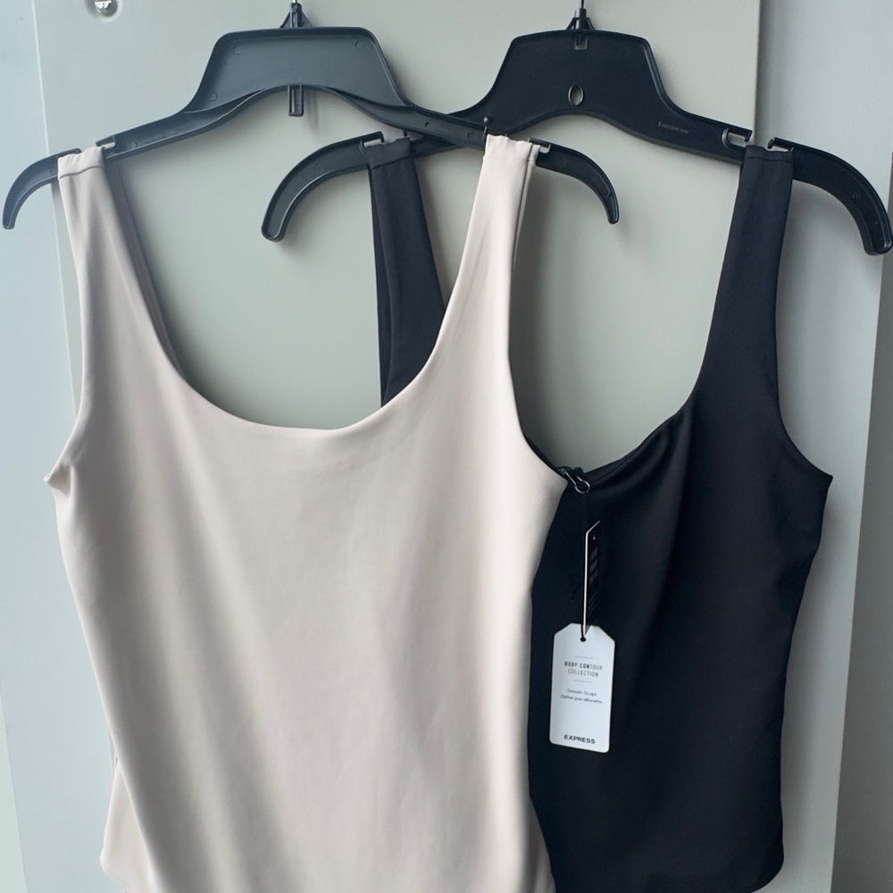 Express Black and Cream thong body suits - both NEW one w/tags still attached !